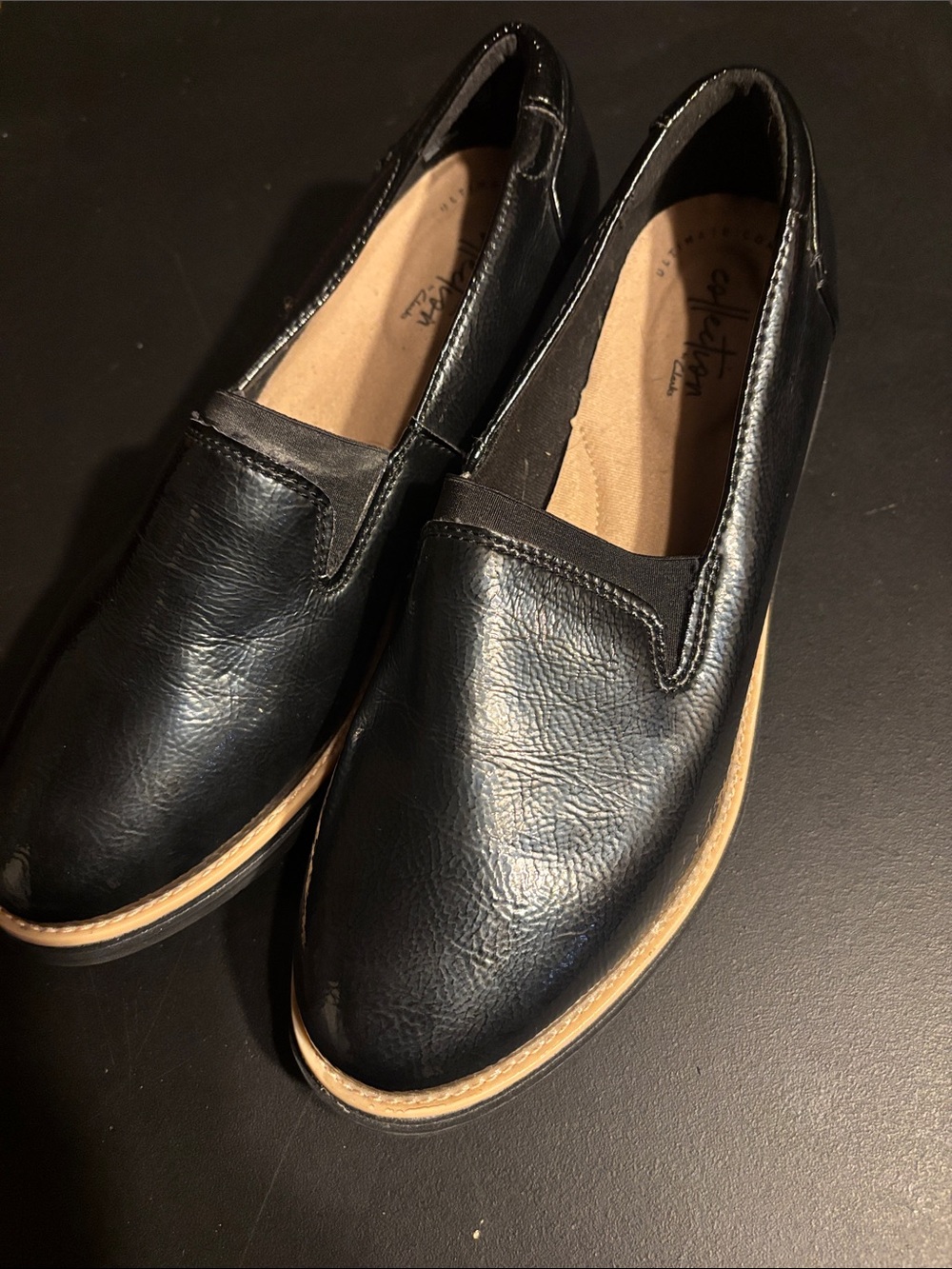 Clarks Black Slip-On Women's Loafers with Tan Trim
